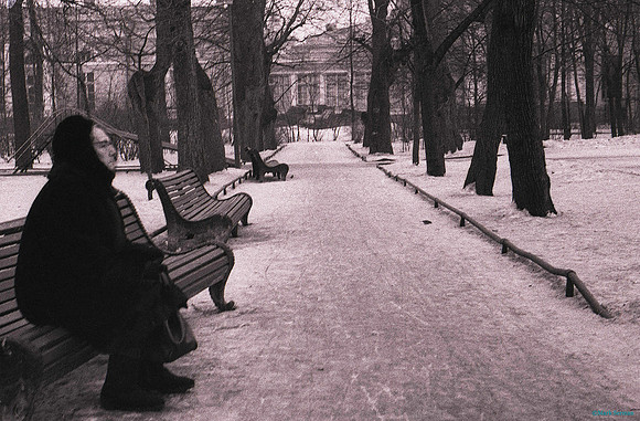 An Old Woman on a Bench