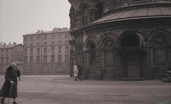 An Old Woman Walking Near Spas na Krovi