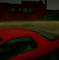 Red Car in a Cleveland Back Yard